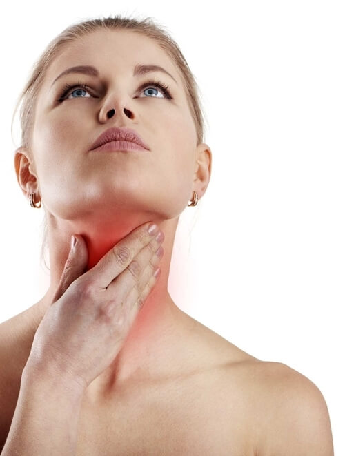 Woman with throat pain
