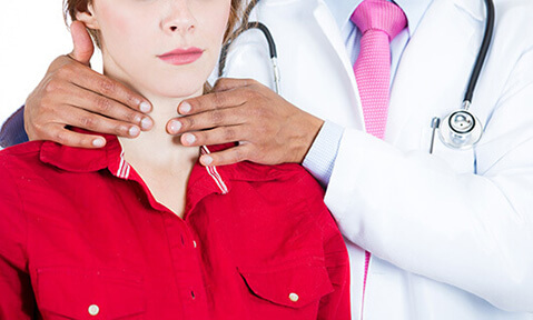 Woman getting checked for head and neck cancer