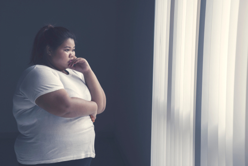 woman looking out of a window