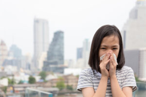 Young girl suffering from allergies