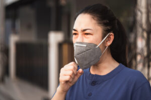 woman wearing covid-19 protective mask