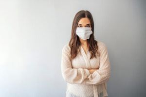 Young woman wearing an M-95 Mask