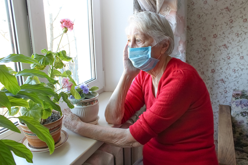 Older woman wearing a mask