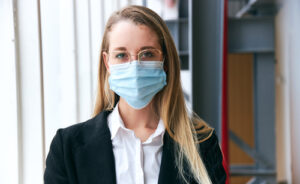 woman wearing mask and glasses