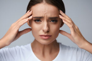 Woman suffering from a migraine 