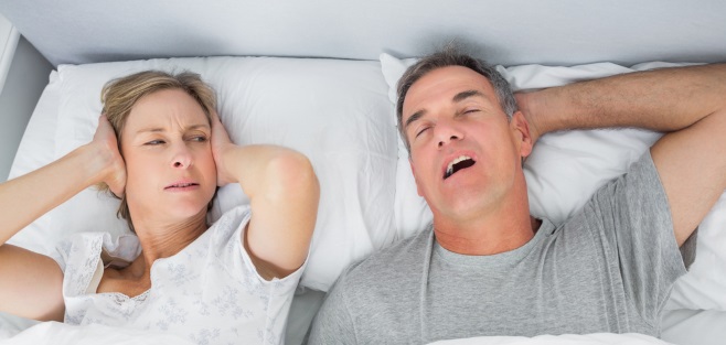 Woman hoping her husband would stop snoring